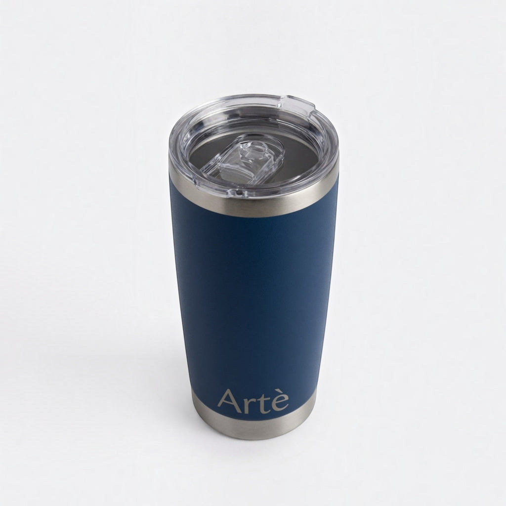 ArtèCup 20oz navy blue stainless steel vacuum insulated tumbler with a clear leak-resistant lid.
