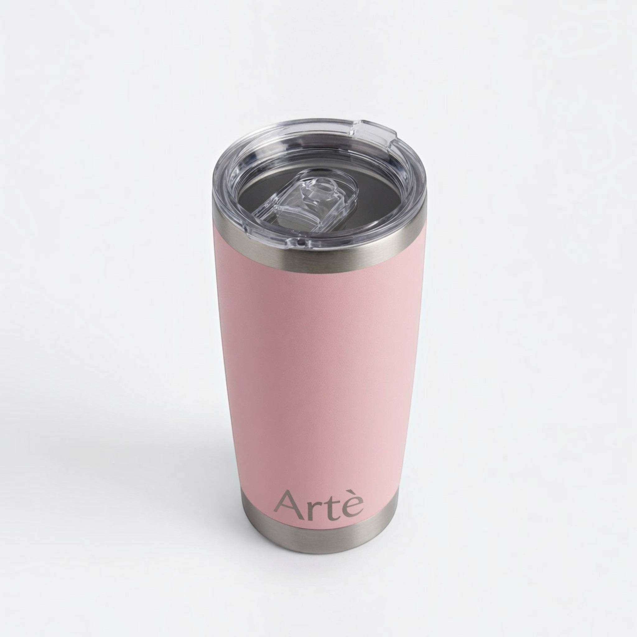 ArtèCup 20oz stainless steel tumbler in matte pastel pink with a clear leak-resistant lid on a white background