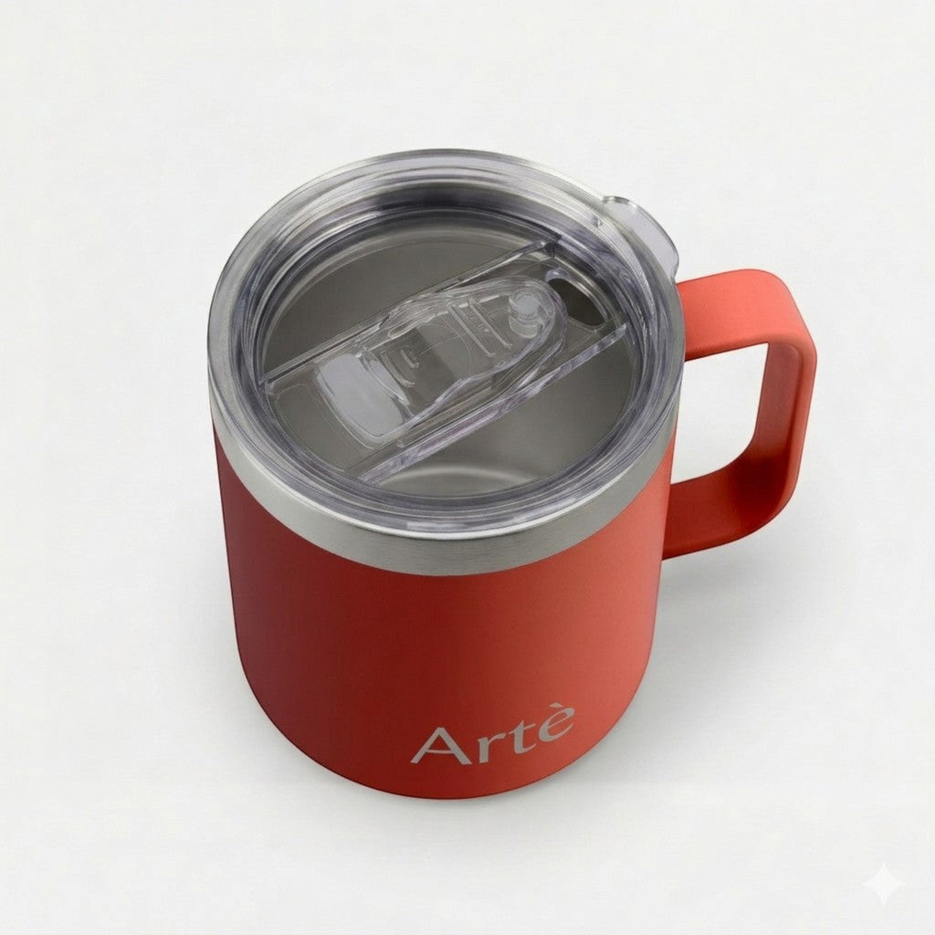 ArtèCup red stainless steel insulated mug with a clear leak-proof lid and ergonomic handle, top-down view.