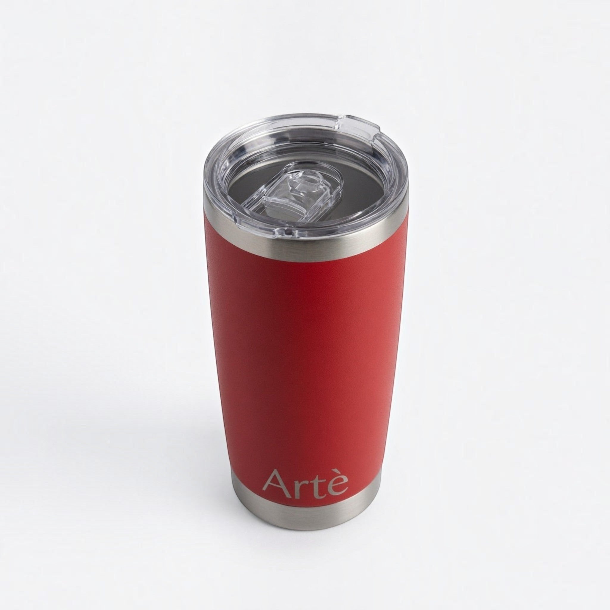 ArtèCup 20oz red stainless steel vacuum insulated tumbler with a clear leak-resistant lid on a white background