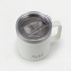 ArtèCup white stainless steel insulated mug with a clear leak-proof lid and ergonomic handle, top-down view.